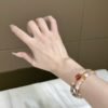 hc-0112-9a8e9046fb64e0559a2bb9232e84bb45.jpg Fairy-Hair Quartz Bracelet with Pixiu NO. 0112