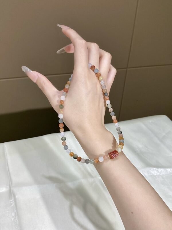 hc-0112-e97a1184c6a77a42616c4f48e347905b.jpg Fairy-Hair Quartz Bracelet with Pixiu NO. 0112