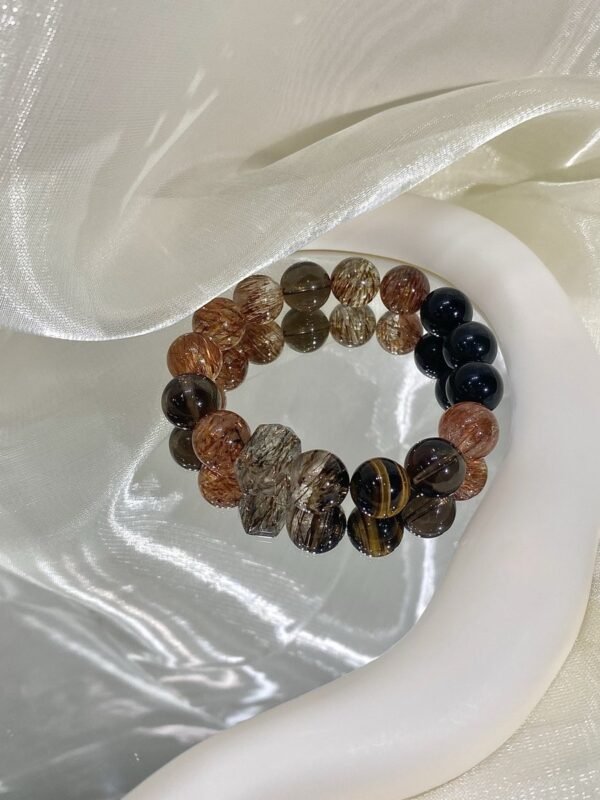 hc-0123-35964679bade450ee72b0955bb6488d3.jpg Black Gold Rutile Double-Point Bracelet NO. 0123