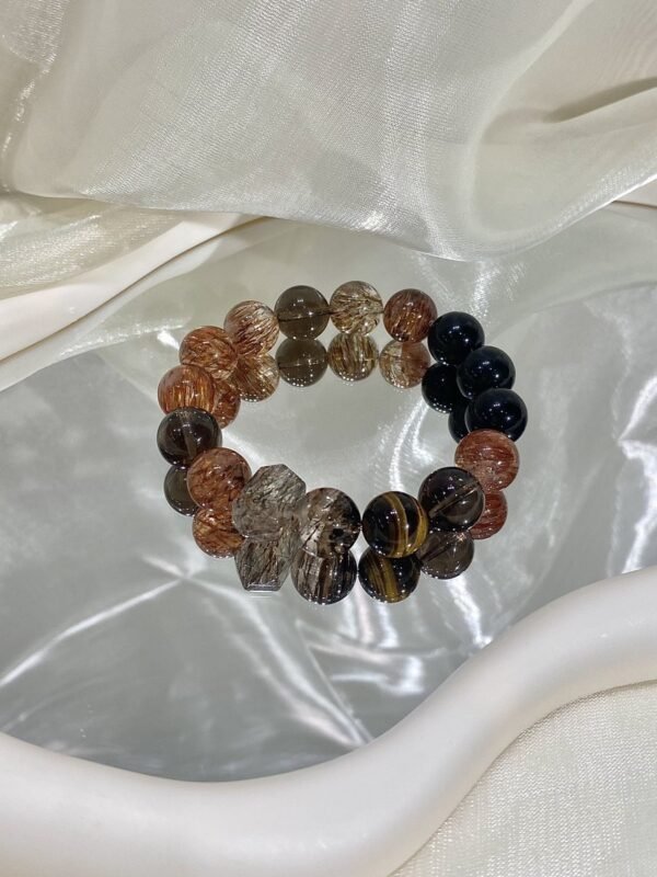 hc-0123-aaf1836416cfe1c83475e02b47f01587.jpg Black Gold Rutile Double-Point Bracelet NO. 0123