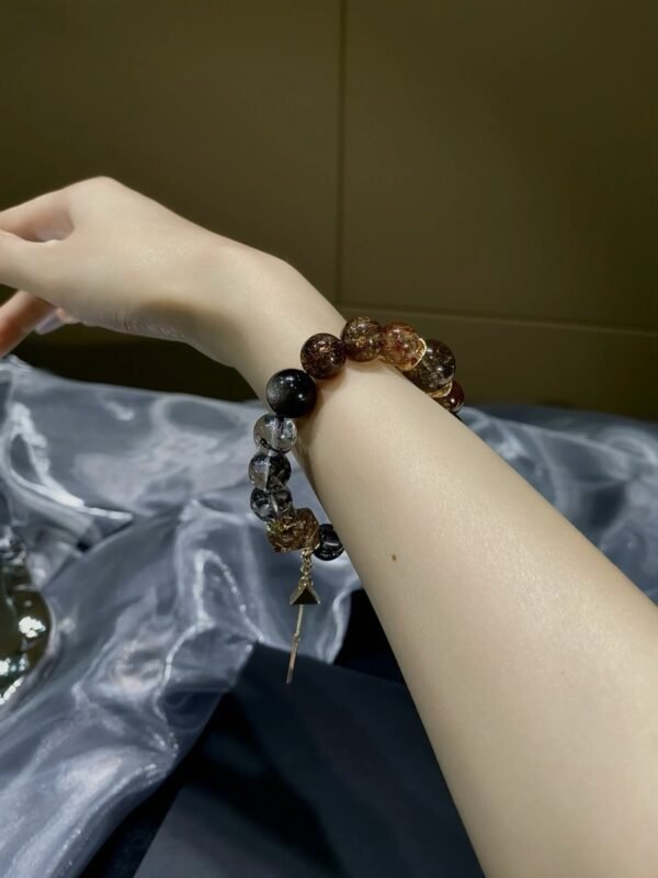 hc-0897-0a2de2f49cd7e60096e2637a99f8449f.jpg Black Gold Rutile Double-Point Bracelet NO. 0897