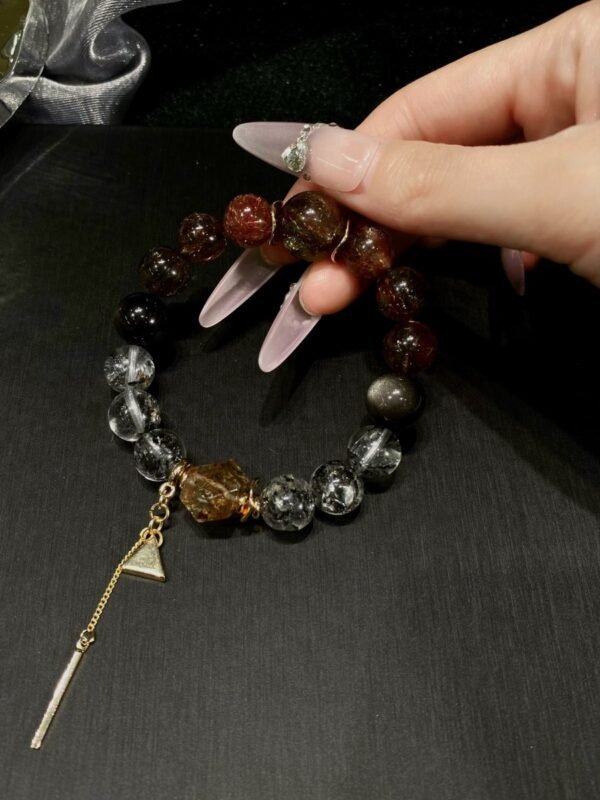 hc-0897-6ca3dfee8c51982df9fb882fedd468ed.jpg Black Gold Rutile Double-Point Bracelet NO. 0897