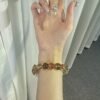 hc-0926-f3526fdb383e303decc9392c525159b5.jpg Black Gold Rutile Freeform Bracelet NO. 0926