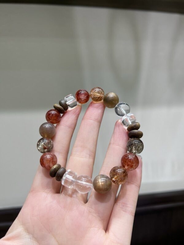 hc-1253-410f9bf5db2c47d27b4afcca1929f459.jpg Black Gold Rutile Bracelet NO. 1253